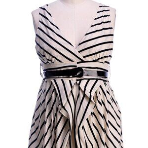 Trendy bubble style mini dress. White with black stripes. Sizes 1X-3X